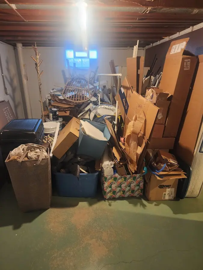 Roll-off dumpster container at job site for 6 Yard Dumpster Rental in Tega Cay